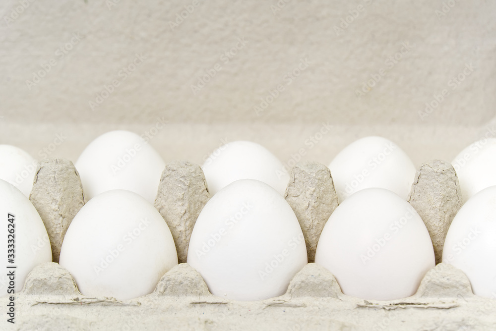 Paper Egg Tray with white eggs. chicken white eggs close up. farm chicken ecologic eggs Paper Egg Tray with white eggs. chicken white eggs close up. farm chicken ecologic eggs