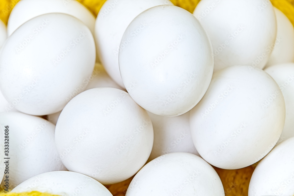 Chiken white eggs close up. farm chicken ecologic eggs Chiken white eggs close up. farm chicken ecologic eggs
