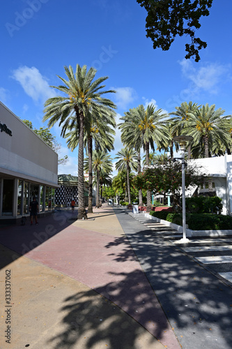 Miami Beach, Florida - March 21, 2020 - Lincoln Road Mall is empty as hotels, restaurants and beach ordered closed due to coronavirus pandemic. photo