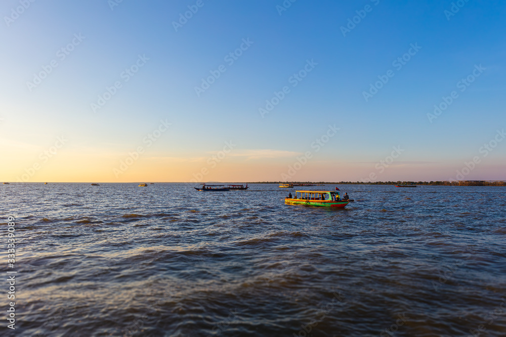 Φωτογραφία Sunset at Tonle Sap Lake, Cambodia, near the Kampong Phluk Floating Village and Siem Reap