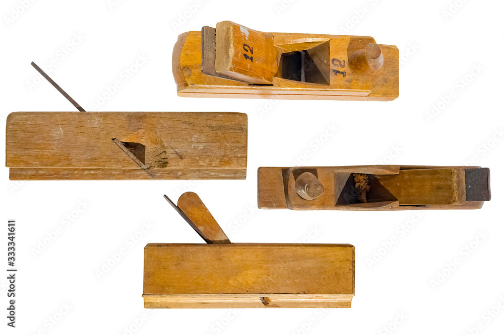 different planes old wooden jointer tools. Isolated on a white background different planes old wooden jointer tools. Isolated on a white background