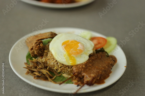 fried rice with satay and egg