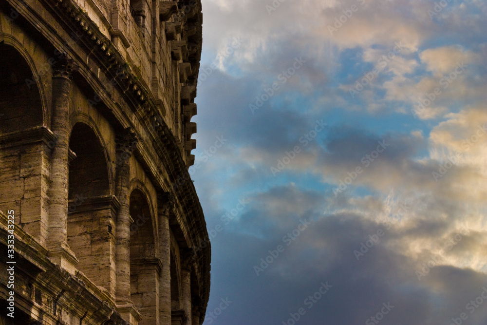 Roman colosseum sunset partial view