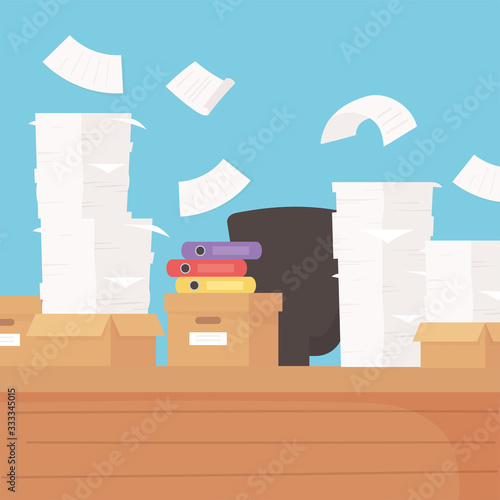 desk and chair office papers boxes and binders work stress
