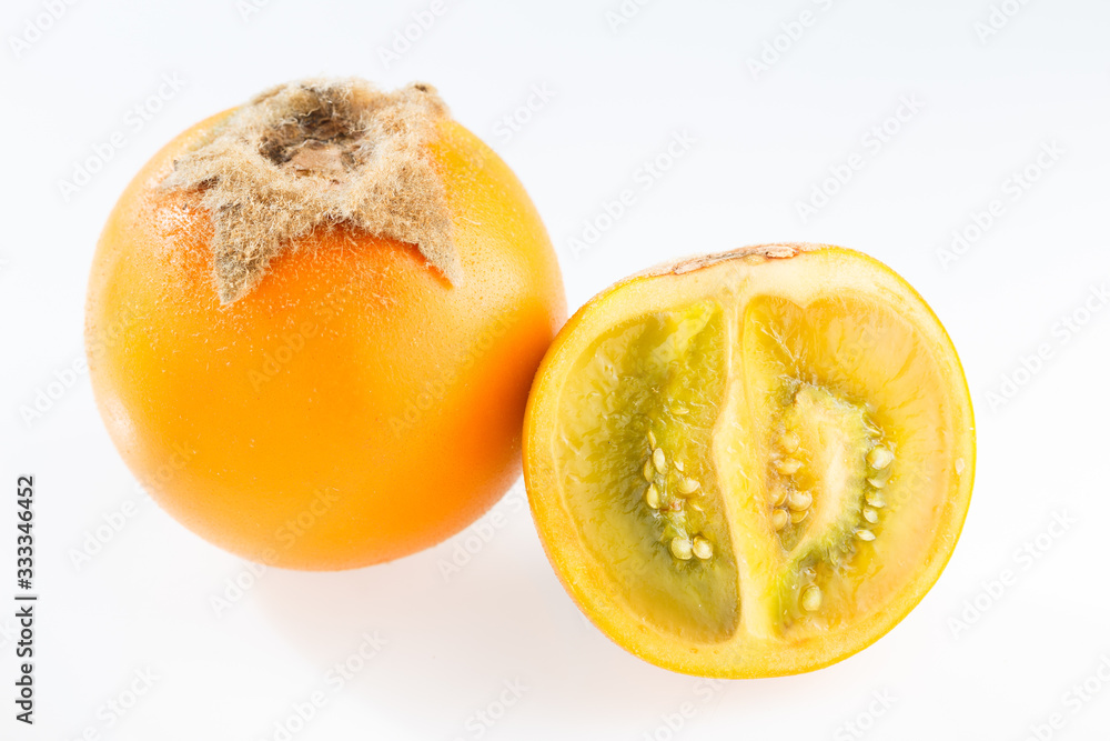 Lulo or naranjilla fruit on white