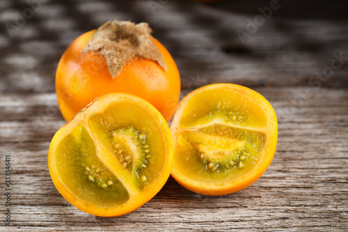 Fruit of lulo or naranjilla on wood photo