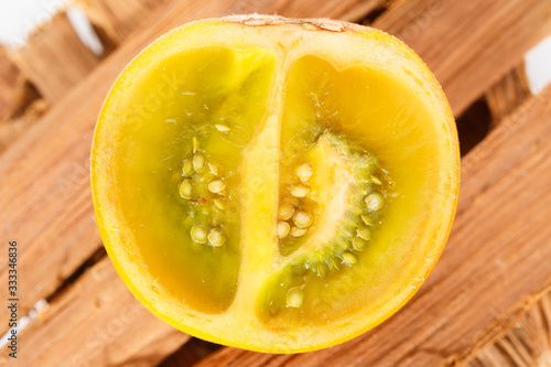 Lulo or naranjilla fruit on wood photo