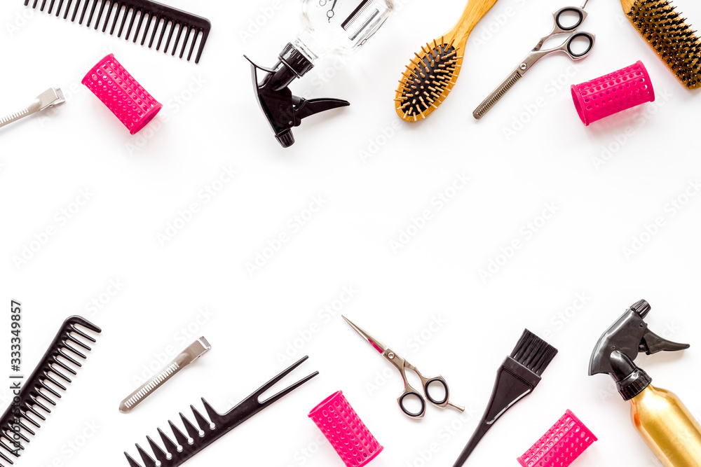Beauty saloon accessories - combs, sciccors for hairdressing - on white background top-down frame copy space Beauty saloon accessories - combs, sciccors for hairdressing - on white background top-down frame copy space