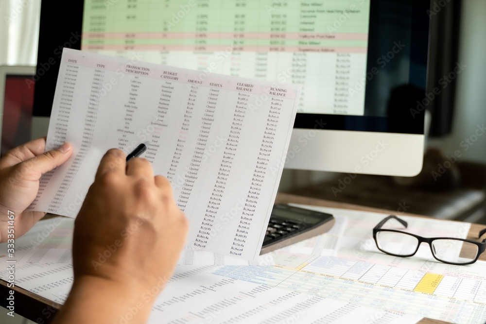 Accounting analysis businessman hand working Strategy Research analyzing financial data and charts Accounting analysis businessman hand working Strategy Research analyzing financial data and charts