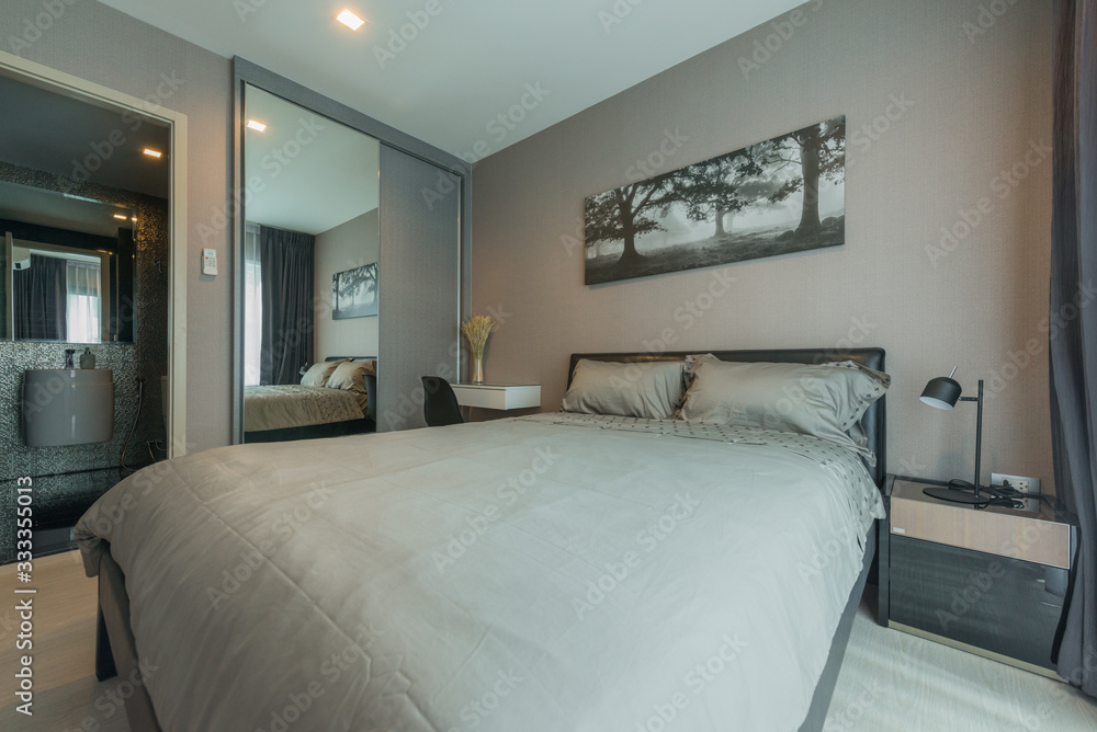 Fototapeta premium Modern peaceful Bedroom interior design in apartment.