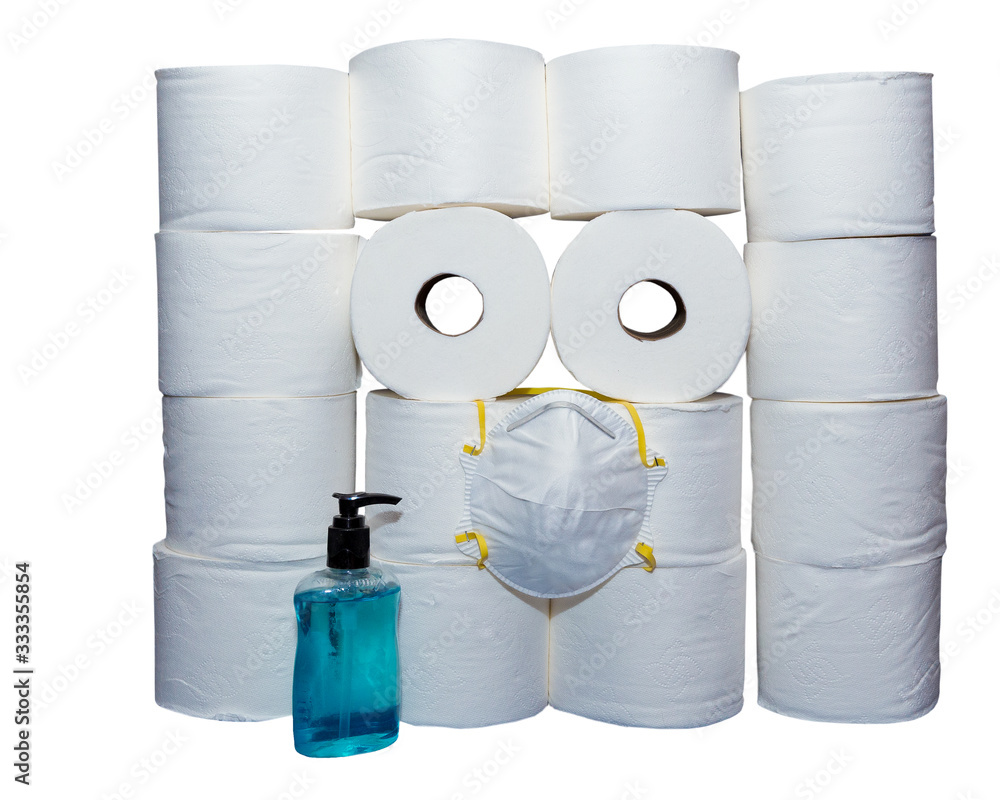 Rolls of toilet paper arranged to look like a face with a face mask and  blue hand sanitizer. White background. Stock Photo | Adobe Stock