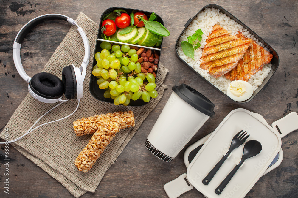 Healthy lunch at office workplace. Takeaway lunch boxes with nutrition