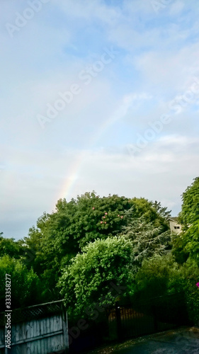 Rainbow on the sky of Browns Bay in Auckland, New Zealand.