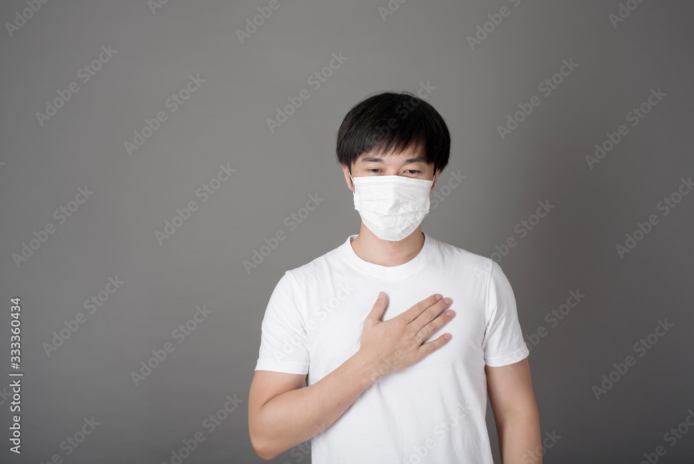 Portrait of Man with surgical mask in studio, Health care concept Portrait of Man with surgical mask in studio, Health care concept