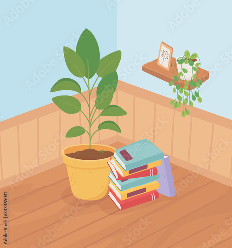 sweet home plant in pot books on floor