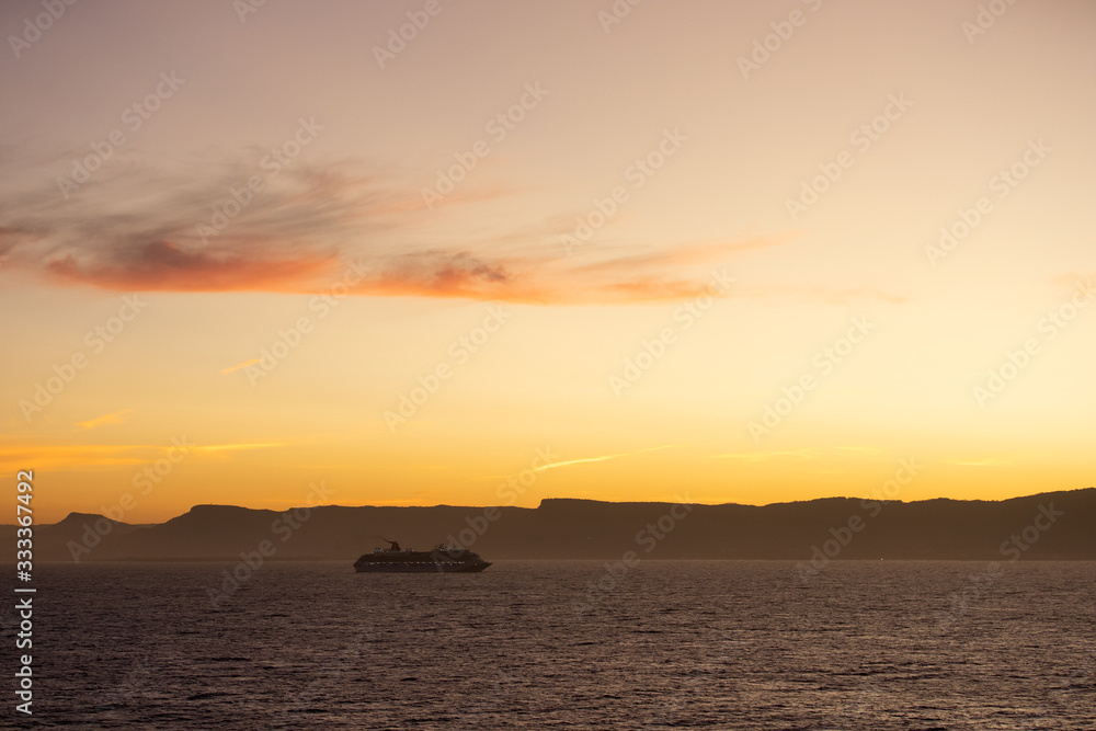 Photo of a cruise ship at sunset shot on March 2020