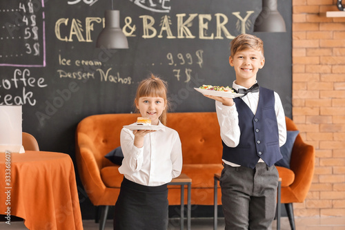Cute little waiters in rest...