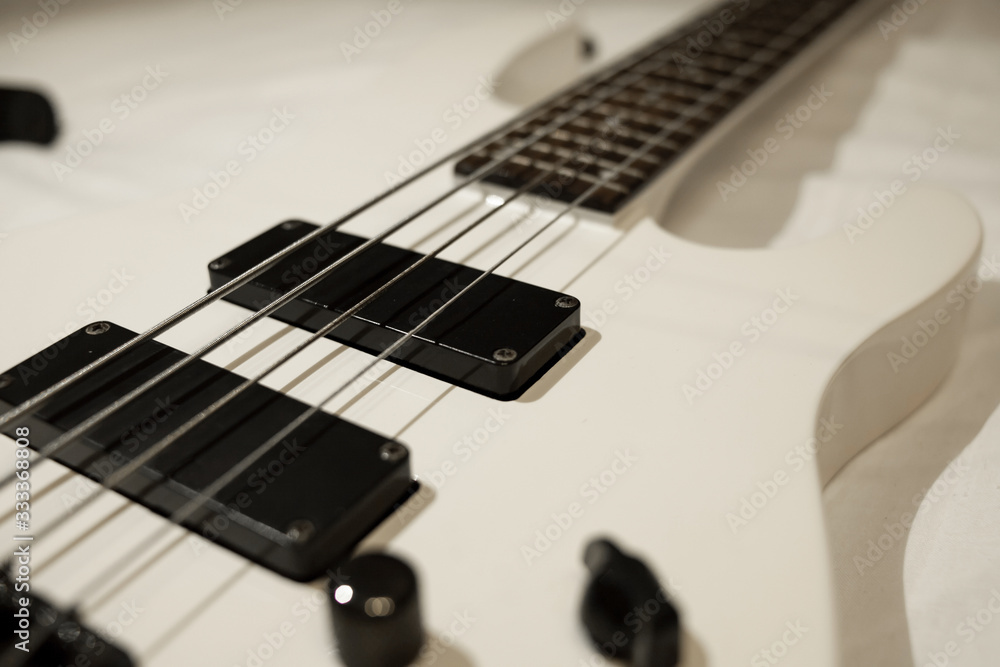 minimalism flat lay bass guitar isolated on white background minimalism flat lay bass guitar isolated on white background