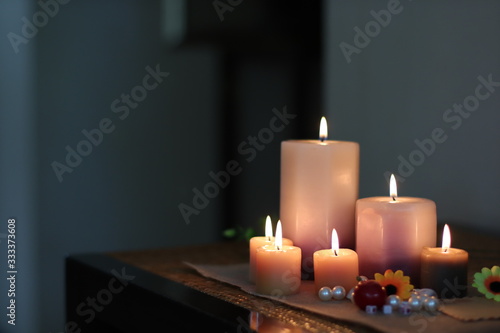 set candles flame on black background
