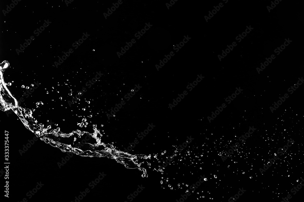 Splash of clean water on dark background Splash of clean water on dark background