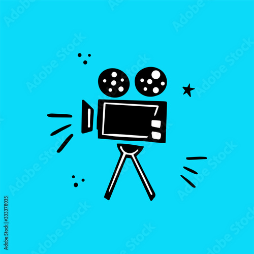 Retro movie camera vector illustration in doodle style.