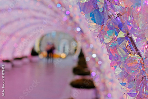 Pink and blue pearl sequins on the background of the tunnel photo