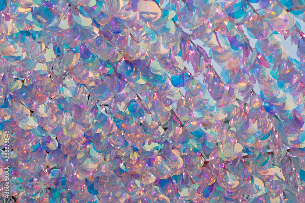 Fototapeta premium Pink and blue mother of pearl sequins background or texture