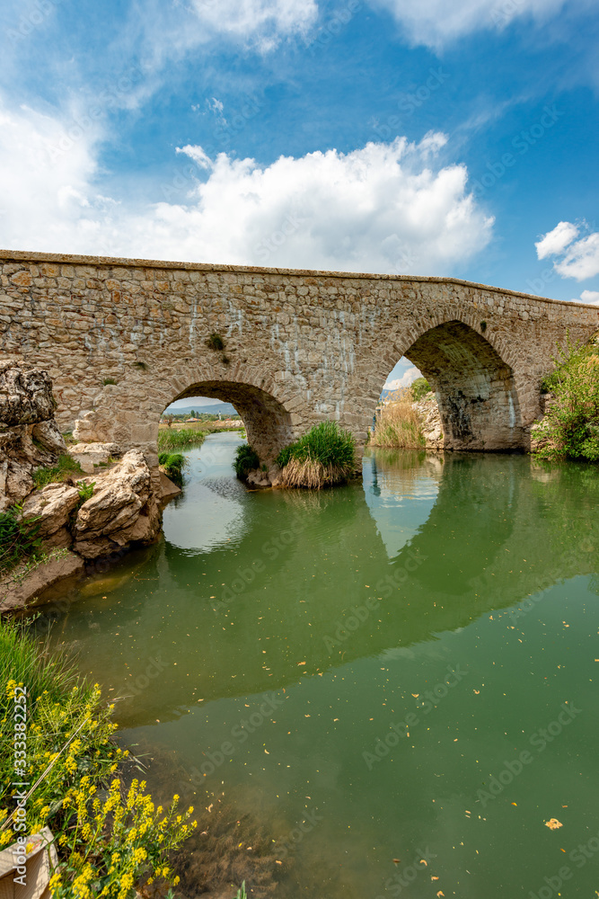 Seki, Elmalı - Antalya / Turkey. April 30, 2018. Xanthos river and historic Ottoman bridge at Urluca village near Fethiye town in Turkey.