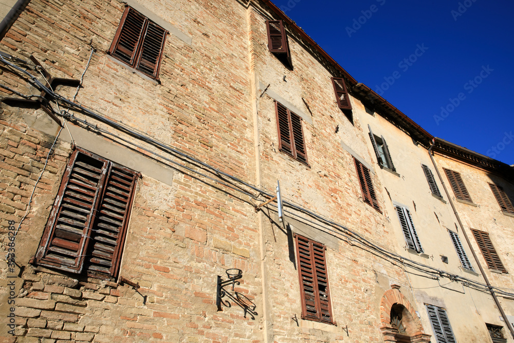 Corinaldo (AN), Italy - January 1, 2019: View of an old facade in Corinaldo village, Corinaldo, Ancona, Marche, Italy