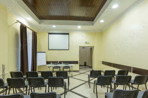 Interior of a conference room in hotel ready for a meeting © rilueda