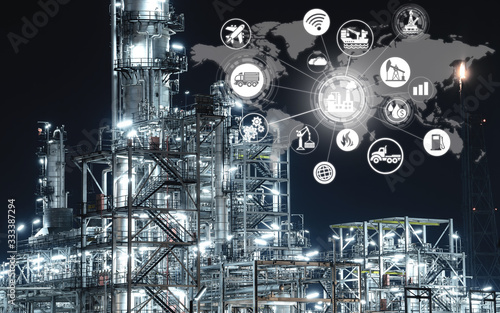 Industry 4.0 concept of Oil refinery with global energy network icon, Industrial petrochemical plant at night, Thailand