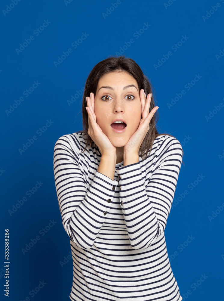 Brunette young woman wearing a striped T-shirt Brunette young woman wearing a striped T-shirt