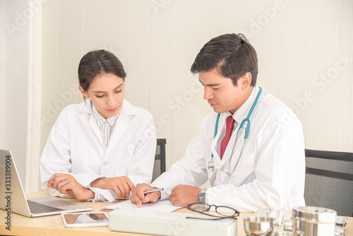 Doctor teamwork, orthopedic surgeon, orthopedist, working in hospital medical clinic office meeting room discussing on diagnostic exam on patient care operation service.