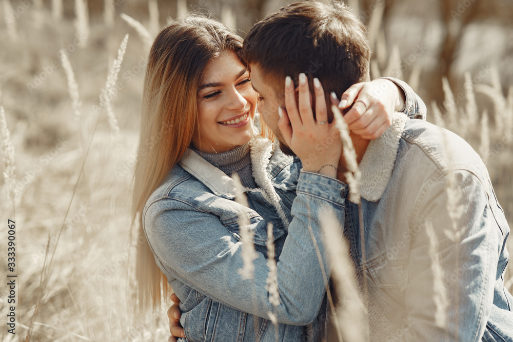 Woman in a jeans clothes. Couple in a spring forest. Woman in a jeans clothes. Couple in a spring forest.