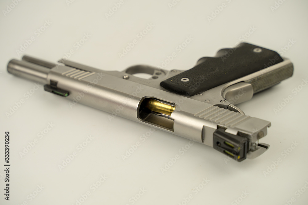 1911 pistol model gun On a white background,45acp gun. 1911 pistol model gun On a white background,45acp gun.