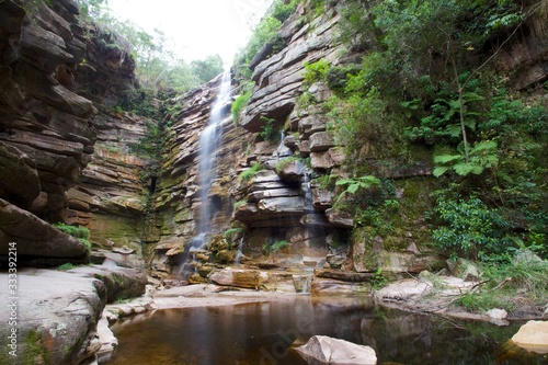 Waterfall in the forest. Name: Mosquito Waterfall / Chapada Diamantiva, Brazil photo