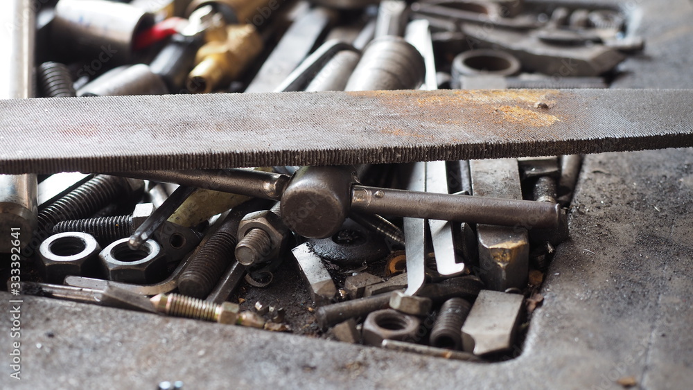 Old and dirty tools Placed in a mess Old and dirty tools Placed in a mess