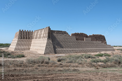 Kyzyl Kala fortress (after reconstrucrion), one of the most popular touristic destination in the country. Karakalpakstan, Uzbekistan, Central Asia. photo