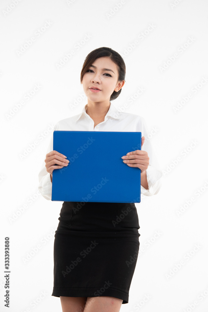 Portrait of young happy asian businesswoman hand hold report document isolated over white background. Portrait of young happy asian businesswoman hand hold report document isolated over white background.
