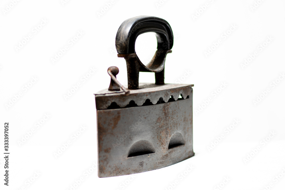 Antique coal iron isolated on white background Antique coal iron isolated on white background