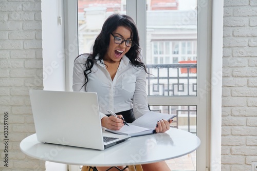 Beautiful business woman working with computer laptop