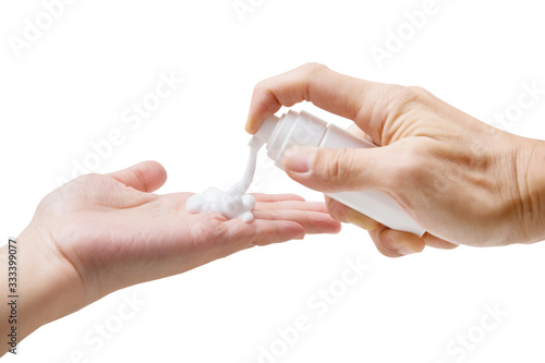 Bottle to press foam to wash hands on white background