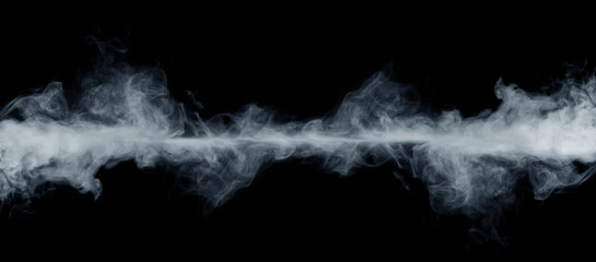 Panoramic view of the abstract fog or smoke move on black background. White cloudiness, mist or smog background.