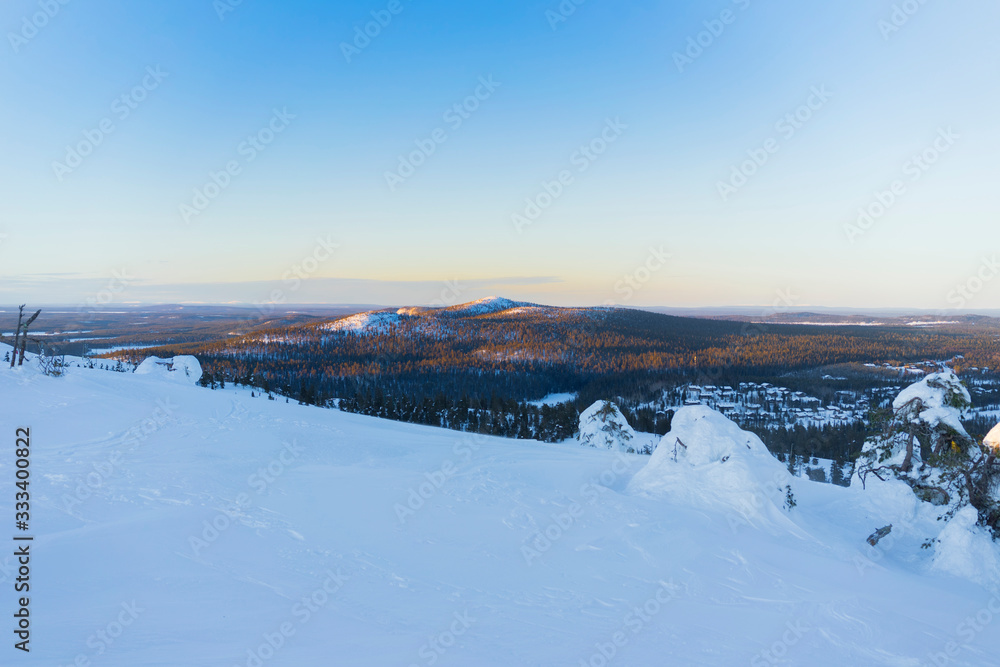 Ruka ski resort slopes. Ruka, Finland, aerial view forest mountains