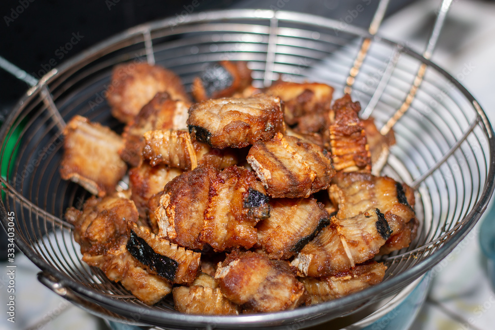 Deep fried yellow stingray, cut into bite-sized pieces