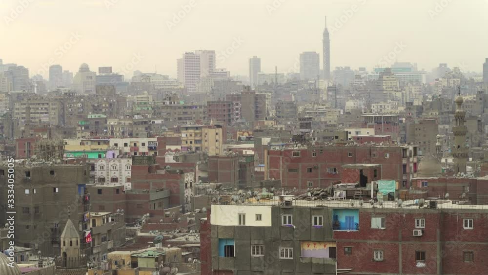 Panorama of Cairo at dusk. Pollution and overpopulation are the main ...