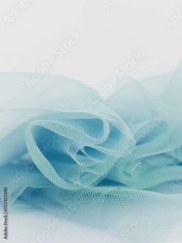 abstract fabric background, tulle background, abstract background, light blue fabric background, folded tulle, aquamarine fabric, powder blue tulle