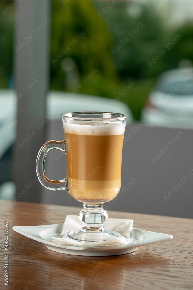 latte on the wood table latte on the wood table
