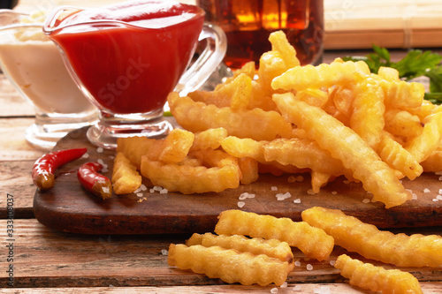french fries on wooden table