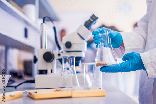 Medicine, pharmacy and cosmetology concept in laboratory scientist working on research 